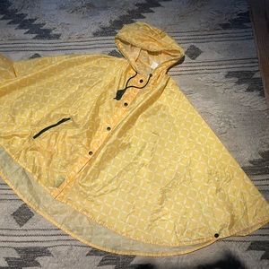 Caper Poncho, collapses into pocket